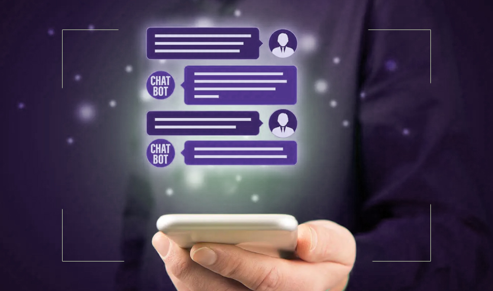 This image portrays a human hand holding a mobile phone, with chat icons emanating from the device.